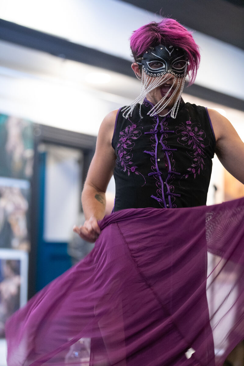 Masked dancer performing at Aristocratix