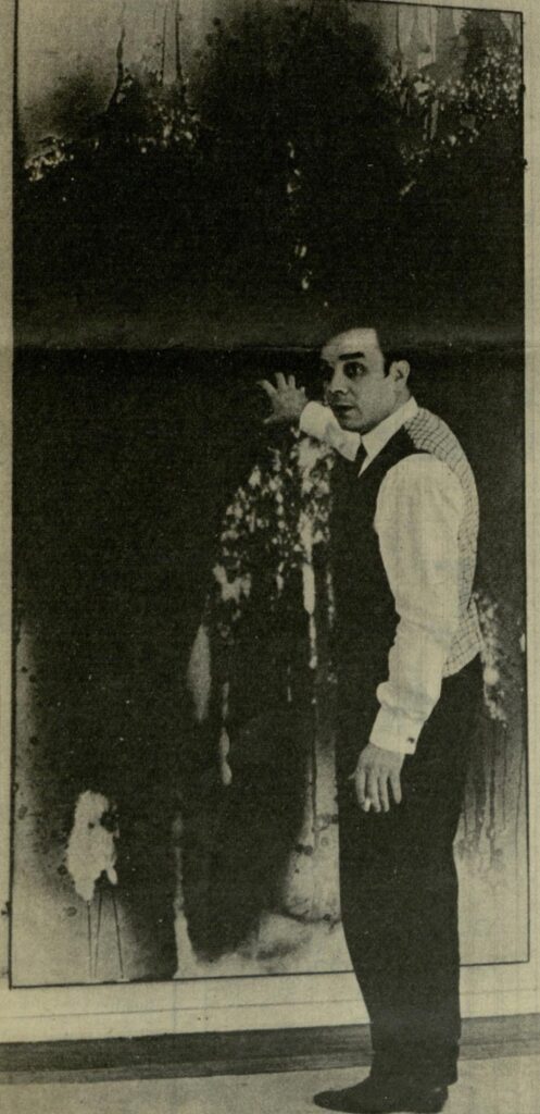 Yves Klein in front of one of his blue monochromes, 1962 (public domain)