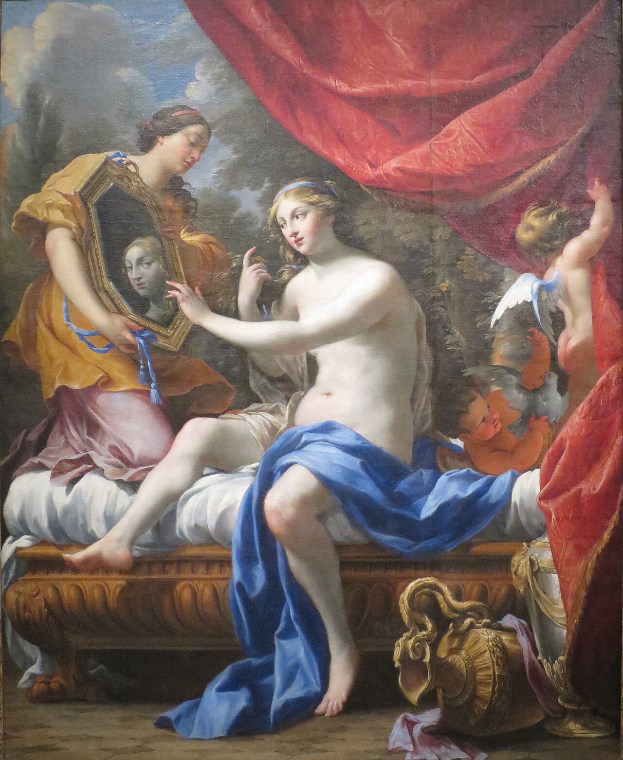 Simon Vouet, The Toilet of Venus, c. 1628 \u2014 oil on canvas. A bare-breasted Venus sits at her dressing table attended by cherubs, her luminous skin marking the birth of French Baroque sensuality.