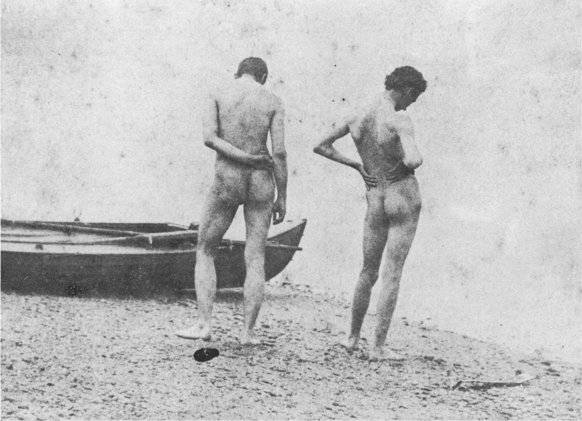Thomas Eakins photographing nude male models in his studio. The artist himself is visible holding the camera, with unclothed models positioned before him.