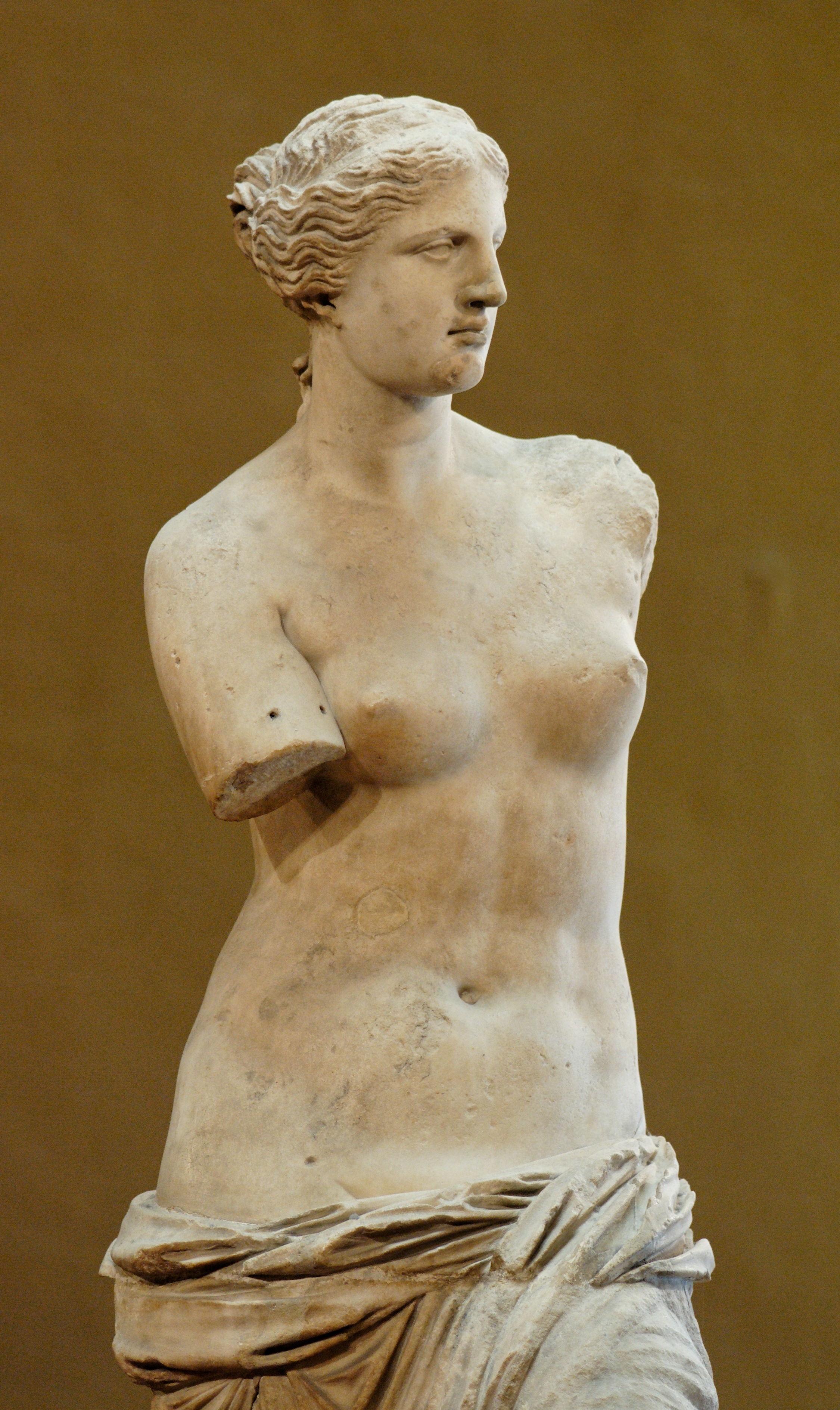 Venus de Milo, ancient Greek marble sculpture of Aphrodite, c. 130-100 BCE, at the Louvre Museum